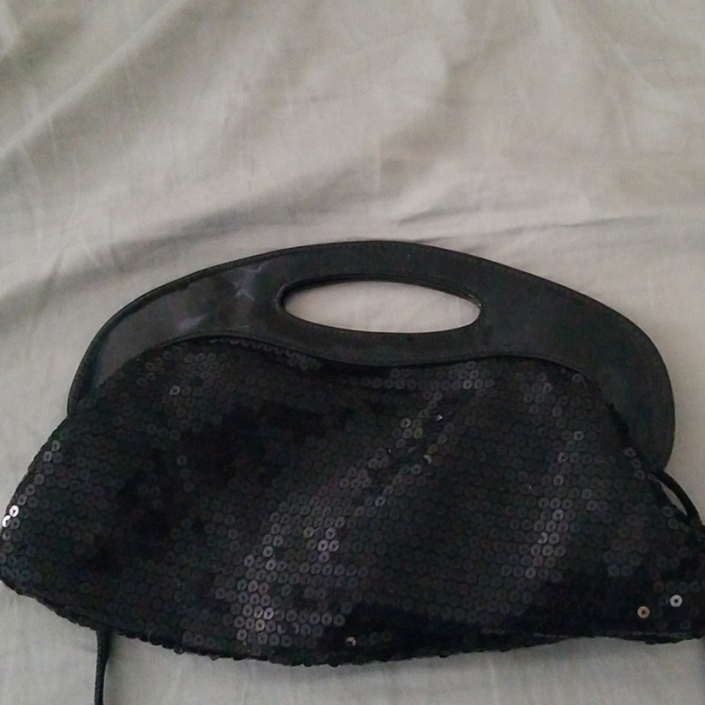Sequined black clutch
